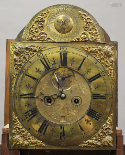 A mid-18th century mahogany longcase clock with eight day movement striking on a bell, the brass