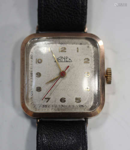 An Arnex 9ct gold curved square cased gentleman's wristwatch with signed jewelled movement, the
