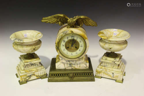 A late 19th century French marble and brass clock garniture, the drum cased clock with eight day