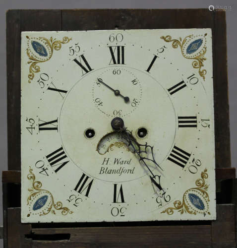 A George III oak longcase clock with eight day movement striking on a bell, the 12-inch painted