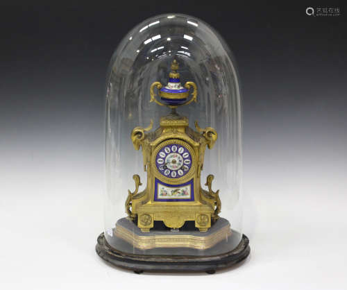 A late 19th century French gilt spelter and porcelain mantel clock with eight day movement
