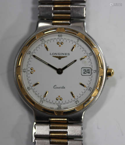 A Longines Quartz stainless steel and gilt metal gentleman's bracelet wristwatch, the signed white