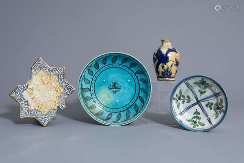 A star shaped tile, two plates and a small vase, K...