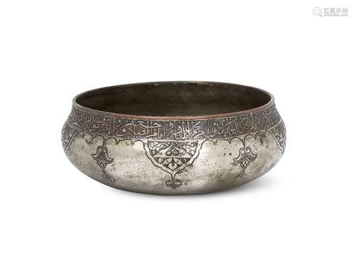 A Zand or Qajar tinned copper bowl, Iran, 18th-19th century, the rim inscribed with a band of fine