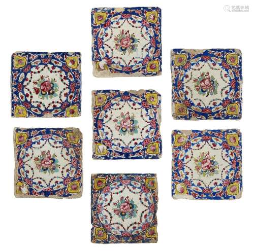 A group of Qajar pottery tiles, Iran, late 19th century, underglaze painted in pink, cobalt,