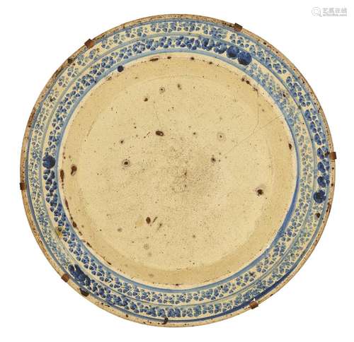 A rare and early Canakkale pottery dish, Ottoman Turkey, late 17th/early 18th century, of deep form,