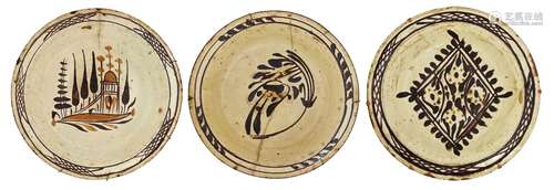 A group of three Canakkale pottery bowls, Turkey, 19th century, of deep form, underglaze painted