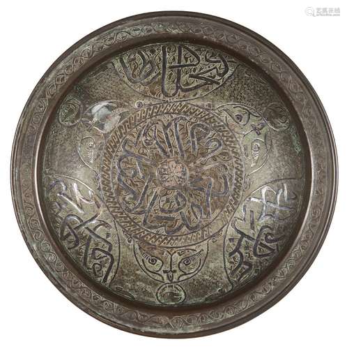 An Ottoman silver-inlaid copper dish, Egypt or Syria, 18th century, of shallow form with slightly