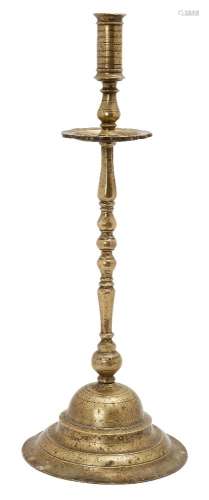 A large Ottoman spun brass candlestick, Turkey, 18th century, on a domed base with several