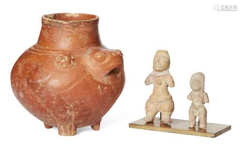 A Pre-Columbian red glazed pottery tripod vessel, with moulded frog head handle flanked on either