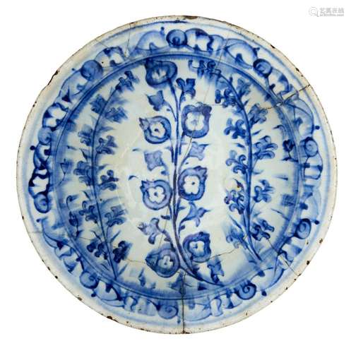 An Iznik blue and white pottery bowl, Turkey, 17th century, of shallow form with everted rim,