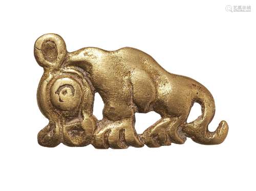 A Scythian gold plaque or buckle in the form of a leopard in profile, Central Asia, 5th century