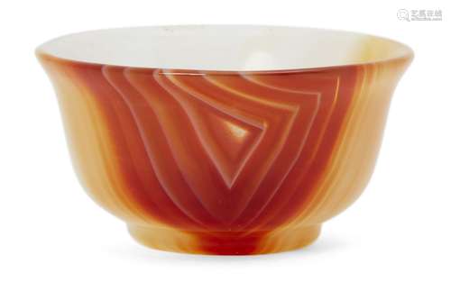 A small carved agate bowl, India or Iran, 19th/20th century, on a short foot, with flared sides, 2.