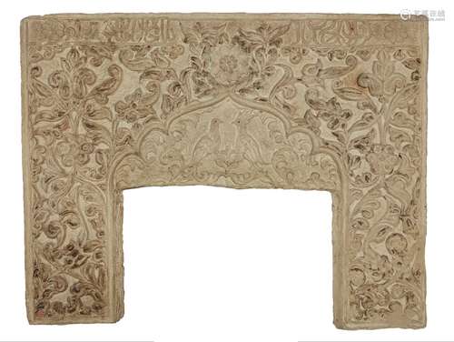 A carved stone fireplace surround with inscription, Caucasus, late 18th/early 19th century, with