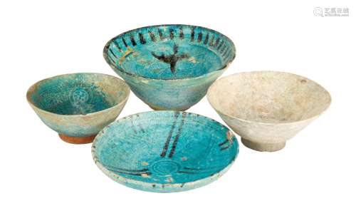 A group of pottery bowls, Iran and Afghanistan, 12th century, three of conical form, one of