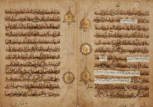 A section from a large Qur'an, Iran, 13th/14th century, 8ff. with 12ll. per page of black rayani