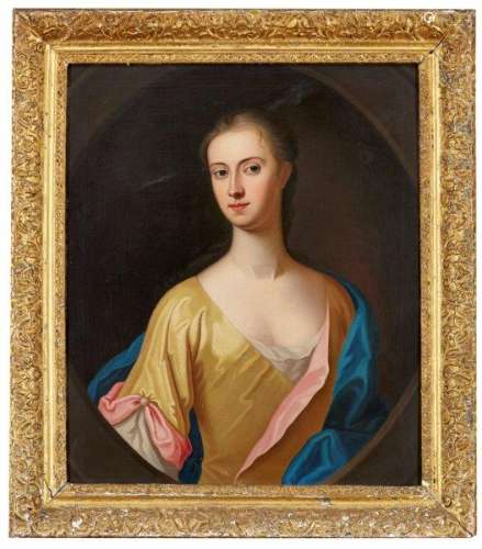Circle of Jonathan Richardson, British 1665-1745- Portrait of a lady half-length in a yellow and