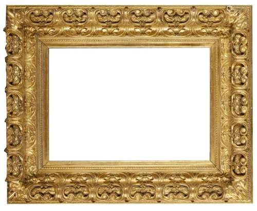 A Bolognese Carved and Gilded Frame, 18th century, with cavetto sight, beaded course, the hollow