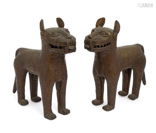 A pair of Nigerian Benin bronze leopards, 20th century, modelled standing, 30cm highPlease refer