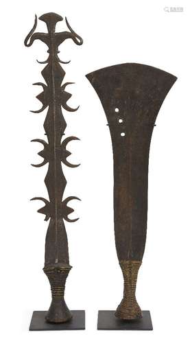 A tribal steel sword, of axe shaped form, with a waist form wire grip, 47cm long, together with