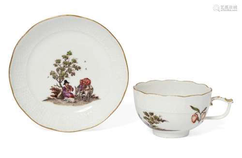 A Meissen porcelain cup and saucer, 19th century, moulded with a basket weave texture to the rims,