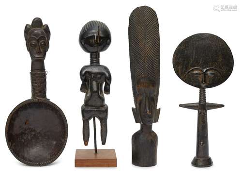 A Tribal hardwood fertility figure, Ashanti, 32cm high, together with a fragmentary darkened