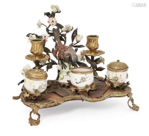 A French ormolu and porcelain encrier desk stand, elements 18th century, to comprise a sand pot,