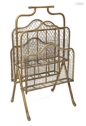 An Edwardian four division brass and mesh magazine rack, on curving feet, 71cm highPlease refer to