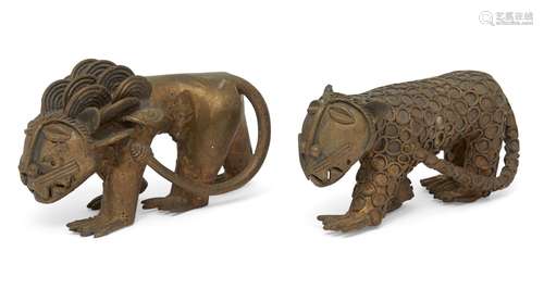 A bronze cat, Ghana, 20th century, modelled standing, 8cm high, together with an Ashanti bronze lion