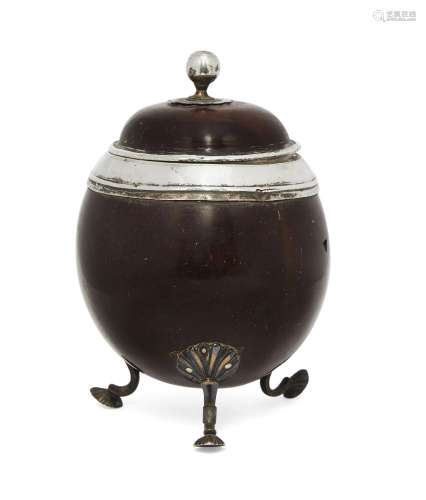 A Georgian silver mounted coconut tea caddy, the lid with a knop form finial with petal form