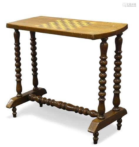 A Victorian walnut and inlaid games table, the rounded rectangular top inlaid with chessboard, on