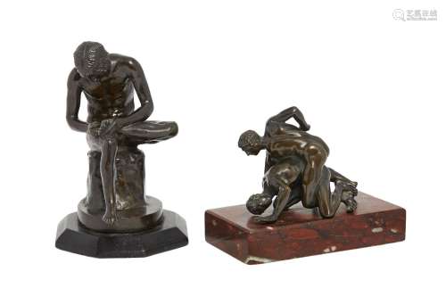 A Grand Tour bronze model of the Vatican wrestlers, 19th century, on a rectangular red marble