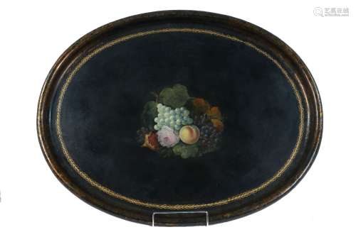 A large Victorian papier mache oval tray, decorated to the centre with a spray of fruit and