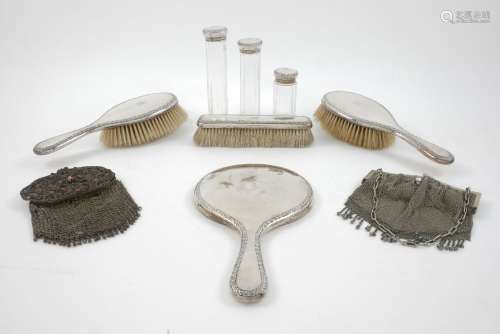 A seven-piece silver dressing table set, London, c.1912, Charles Fox & Co., comprising a mirror,