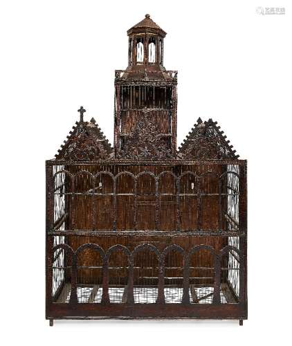 A large wirework bird cage, of architectural form, late 19th/20th century, with an octagonal form