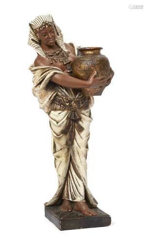 An Austrian painted terracotta figure of an Egyptian girl, late 19th/early 20th century, carrying