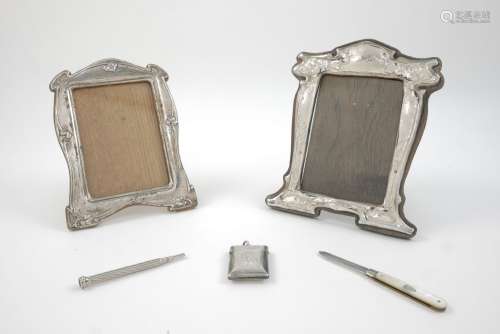 A silver photograph frame, Birmingham, c.1909, J.Aitken & Son, with wooden back and floral
