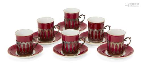 A George Jones and Sons Ltd. porcelain coffee set, 20th century, decorated with Sang-de-Boeuf