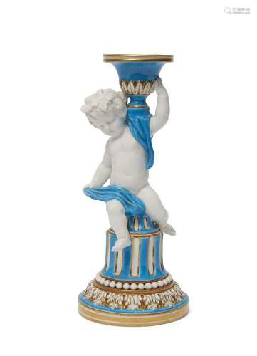 A Minton single blue and gilt porcelain candlestick, 19th century, moulded in the form of a cherub
