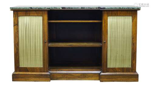 A Regency rosewood inverted breakfront side cabinet, the later green marble top above central open