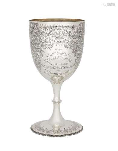 An Edwardian silver cycling trophy, Sheffield, c.1901, Walker & Hall, the large goblet-shaped cup