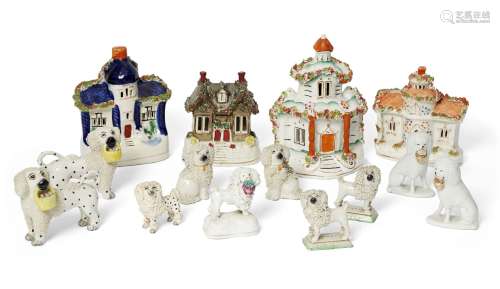 A collection of four Staffordshire pottery pastille burners, in the form of houses, 19th century,