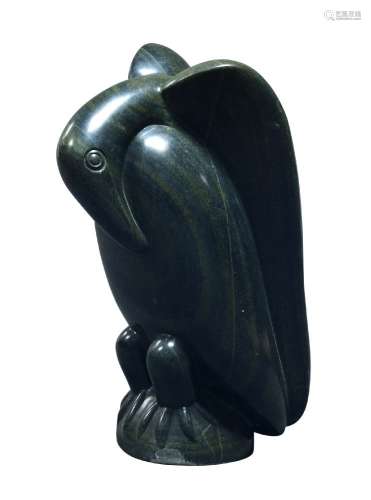 A large green serpentine carving of a bird, in the Shona style, 20th century, modelled with