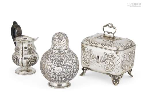 An Austrian silver sugar box, Vienna, c.1870 designed as a chest raised on four feet, the body
