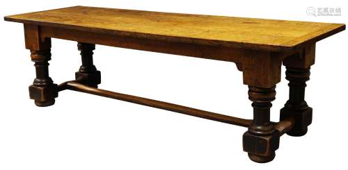 A large oak refectory table, 19th century, the triple plank top, with cleated ends, on turned