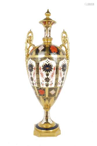 A Royal Crown Derby porcelain twin handled vase, 20th century, decorated in the Imari palate,
