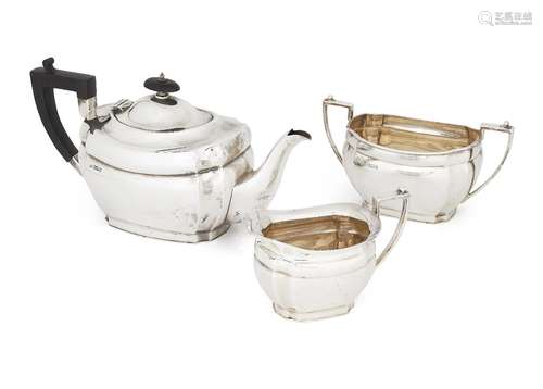 A three piece silver tea set, Sheffield, c.1923, Alexander Clark & Co., comprising a teapot, sugar