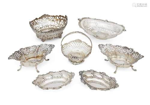 A group of seven Victorian and later pierced bonbon dishes, the largest, c.1900 with scalloped rim