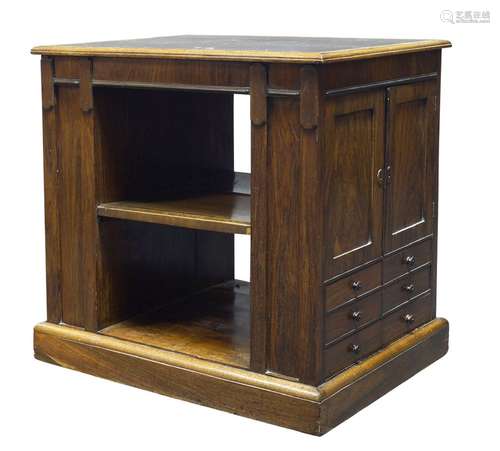 A George IV rosewood library cabinet, the rectangular top inset with green leather writing surface