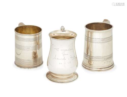 Three silver tankards, two with reeded decoration, one London, c.1811, maker's marks rubbed, the